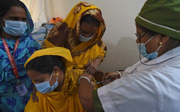 Bangladesh begins vaccinating textile industry workers